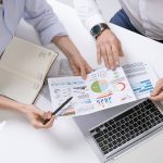 hands-of-two-contemporary-brokers-discussing-finan-LP76AF8-rbbahl3fmdvgxp29z9gd3chq3auu6yybgrseb2gdp8